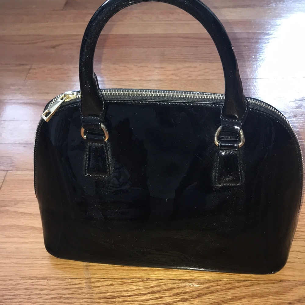 Black patent leather handbag